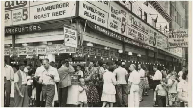 Crowds gathered outside Nathan’s Hot Dogs.