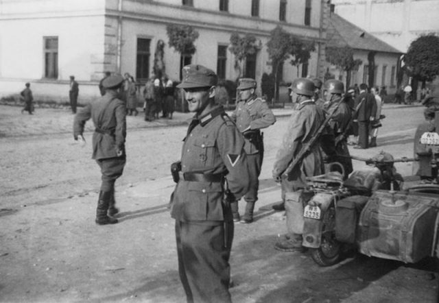German and Soviet soldiers stroll around Sambir after the German-Soviet invasion of Poland.