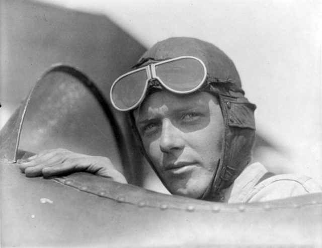 Charles Lindbergh in open cockpit of airplane at Lambert Field, St. Louis, Missouri.