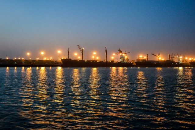 Night view of the Port of Chittagong from Karnaphuli River (East-west view). Photo by Moheen Reeyad CC BY-SA 4.0