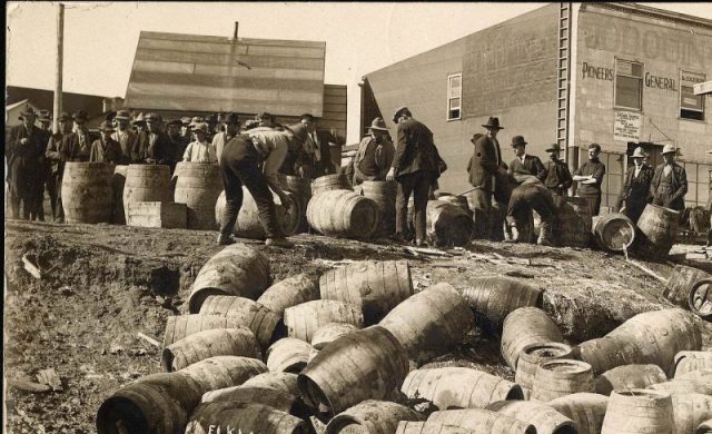 A police raid confiscating illegal alcohol, in Elk Lake, Canada, in 1925.