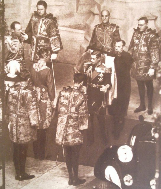 Edward VIII surrounded by heralds of the College of Arms prior to his only State Opening of Parliament, November 3, 1936.