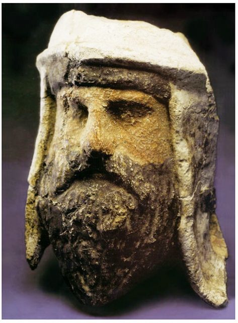 Painted clay and alabaster head of a Zoroastrian priest wearing a distinctive Bactrian-style headdress, Takhti-Sangin, Tajikistan, Greco-Bactrian Kingdom, 3rd–2nd century BC.