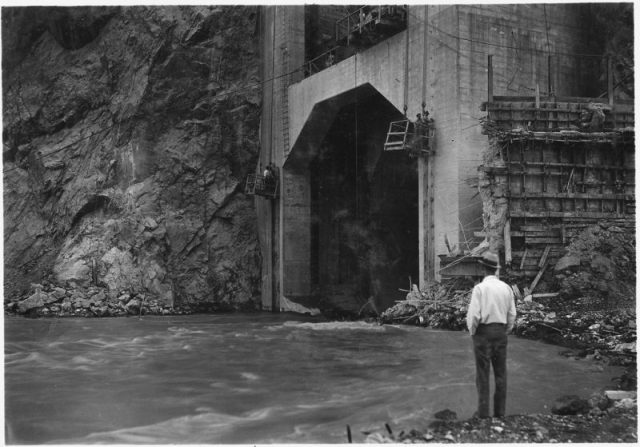 First water to pass through diversion tunnels flowing from outlet portal of Diversion Tunnel.