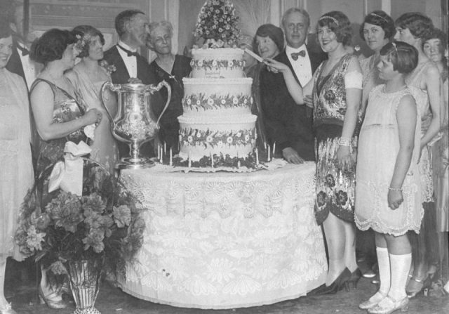 Wearing her thousand-gemmed bracelets, Peaches Browning cuts her three-tier birthday cake at a party given to mark her 16th birthday by her husband, Edward W. Browning, at the Victory club on West 59th St. Photo by NY Daily News Archive via Getty Images