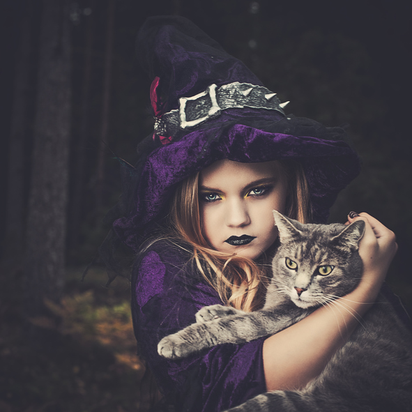 Illustration of a young witch with her cat.