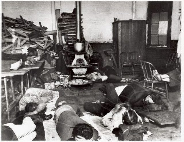 Men sleep on the floor of a New York City homeless shelter.