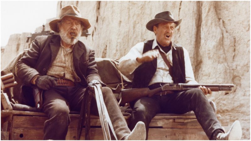 American actors Edmond O'Brien and William Holden on the set of The Wild Bunch, directed by Sam Peckinpah. (Photo by Warner Bros. Pictures/Sunset Boulevard/Corbis via Getty Images)