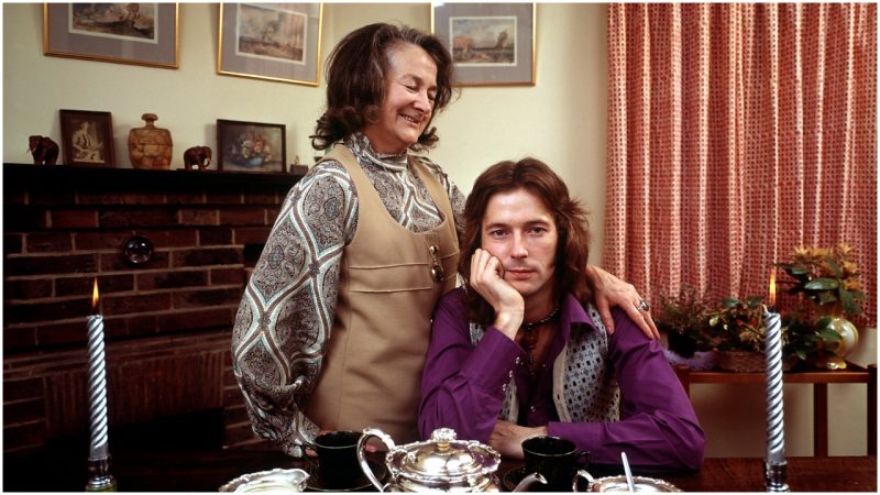 1970: Rock musician Eric Clapton with his grandmother Rose in the house he bought her in Surrey. (Photo by John Olson/The LIFE Picture Collection/Getty Images)