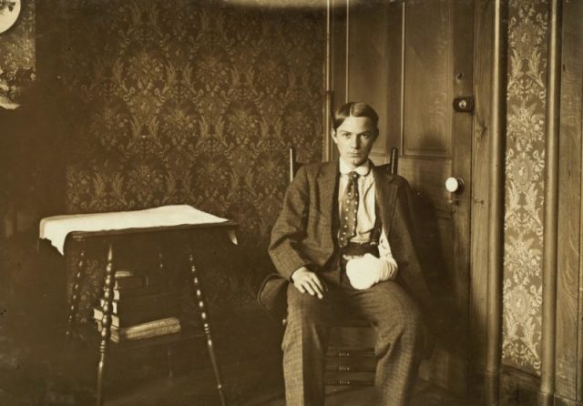 Young boy posing for a photograph