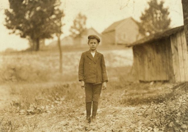 Young boy posing for a photograph