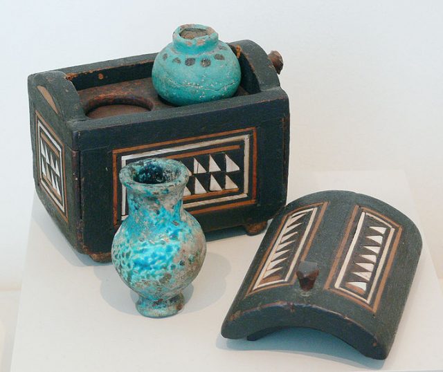 Ancient Egyptian cosmetics case with two ointment jars. New Kingdom of Egypt, 18th dynasty, c. 1400 BC.