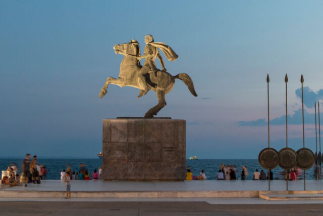 Sunset behind a statue of Alexander the Great