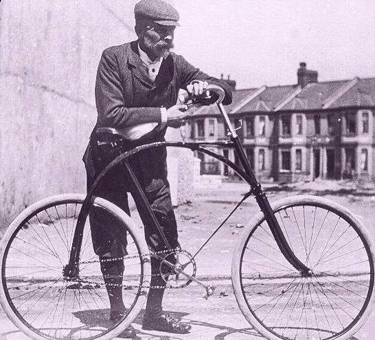A safety bicycle (the ‘new’ alternative to the high wheeler penny-farthing) in Victorian Plymouth, England, with a predecessor of the Starley diamond-frame.