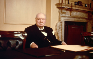 Sir Winston Churchill at his desk