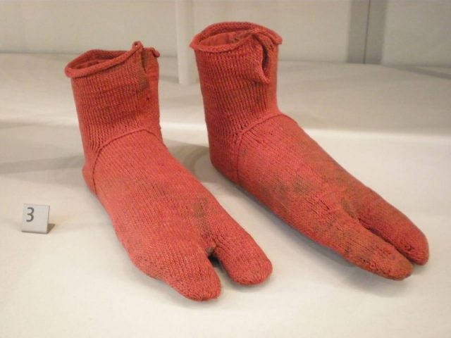 The earliest known surviving pair of socks, created by naalbinding. Dating from 300 AD to 500 AD, these were excavated from Oxyrhynchus on the Nile in Egypt. The split toes were designed for use with sandals. On display in the Victoria and Albert museum, reference 2085&A-1900. Photo by David Jackson CC BY-SA 2.0 uk