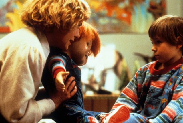 Actress Catherine Hicks and child actor Alex Vincent with Chucky in a scene from the film ‘Child’s Play’ (1988). Photo by United Artists/Getty Images