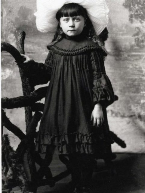 Girl in studio circa 1900