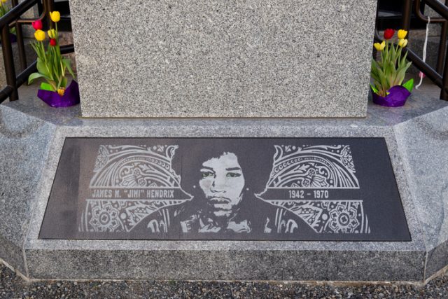 Seattle, Washington, United States – April 24, 2012. Close up of plaque on Jimi Hendrix’s grave. Jimi Hendrix was born November 27, 1942 and would go on to become one of the greatest electric guitarists in history.