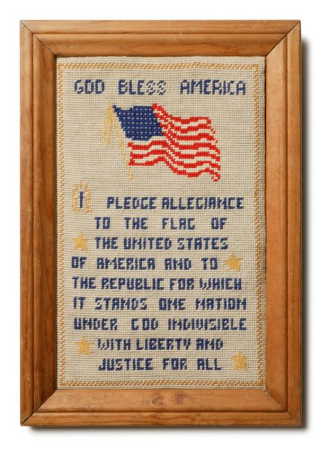 Pledge of Allegiance sampler from the late 1950s or early 1960s with the heading of ‘God Bless America.’