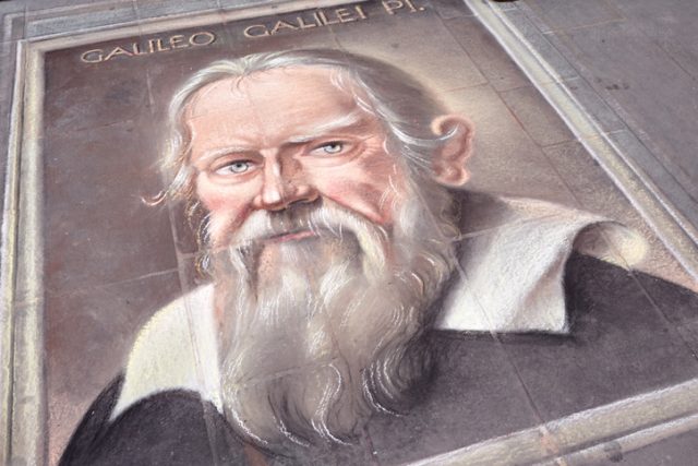 Street art: sidewalk chalk portrait of Galileo Galilei, Pisa, Italy.