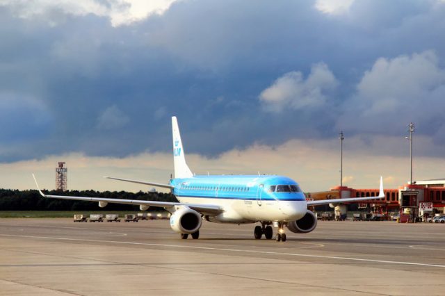 Berlin, Germany – September 9, 2013: KLM Cityhopper Embraer ERJ-190STD at the air field of the Tegel International Airport.
