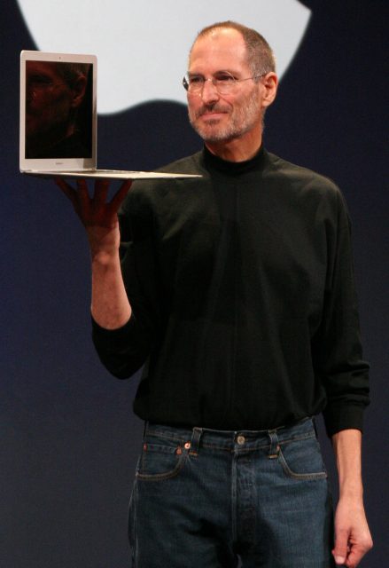 Jobs holding up a MacBook Air at the MacWorld Conference & Expo in 2008. Photo by Matthew Yohe CC BY 3.0