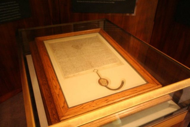 A 1297 copy of Magna Carta, owned by the Australian Government and on display in the Members’ Hall of Parliament House, Canberra. Photo by Wongm CC BY SA 4.0