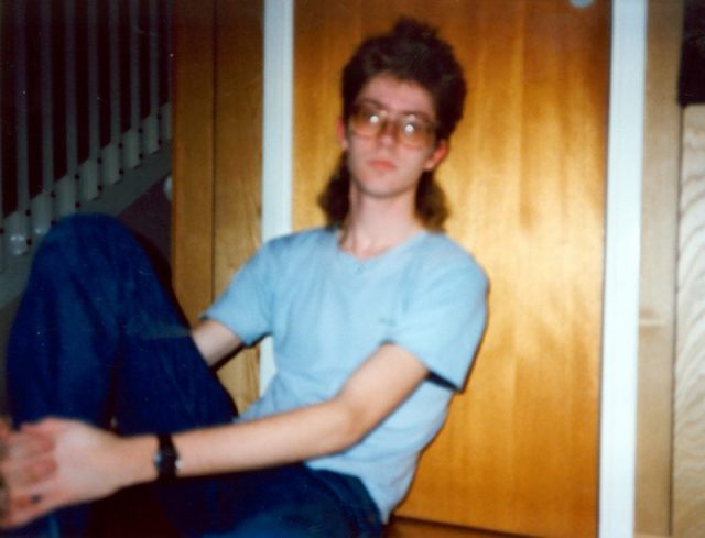 This kid knows how to rock a mullet, 1986. Photo by Bart Everson CC By 2.0