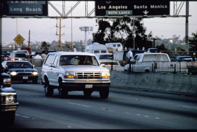 Ford Bronco driving down a California freeway