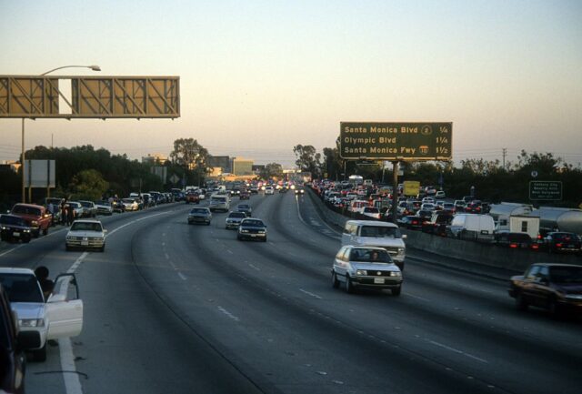 Ford Bronco driving down a California freeway