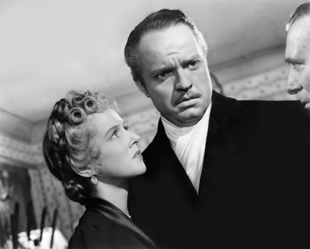 The affair between Kane and Susan Alexander (Dorothy Comingore) is exposed by his political opponent, “Boss” Jim W. Gettys (Ray Collins).