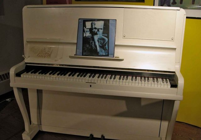 The 1910 piano on which Elton John composed his first five albums, including his first hit single, “Your Song.” Photo by CantosMusic CC BY SA 3.0
