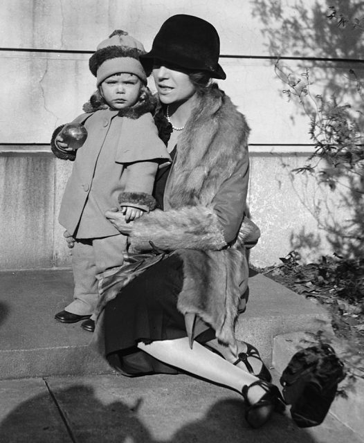 Alice Roosevelt Longworth on her 43rd birthday in 1927 with her daughter Paulina, age two. The child’s biological father was Senator William Borah.