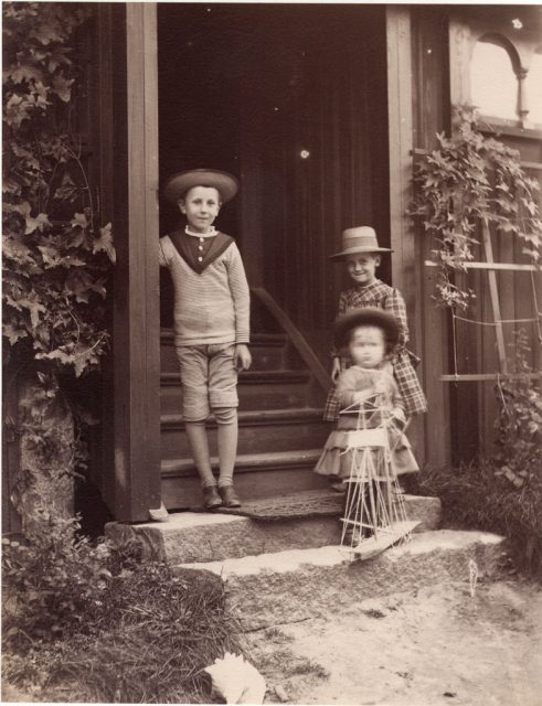 Children with a toy boat, Lysekil, Sweden.