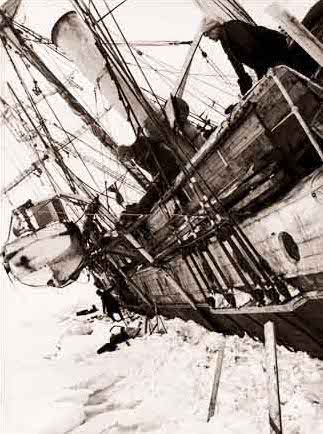 Shackleton looking overboard at Endurance being crushed by the ice