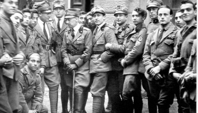 Gabriele D’Annunzio (in the middle with the stick) with some legionaries (components of the Arditi’s department of the Italian Royal Army) in Fiume in 1919.