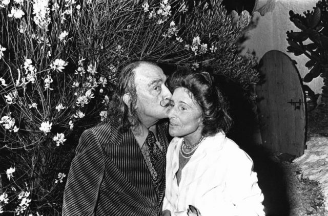 Salvador Dali and Gala, 14 June 1975 in Spain. (Photo by Etienne MONTES/Gamma-Rapho via Getty Images)