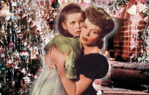 Christmas tree set up next to a fireplace + Margaret O'Brien and Judy Garland as Tootie and Esther Smith in 'Meet Me in St. Louis'