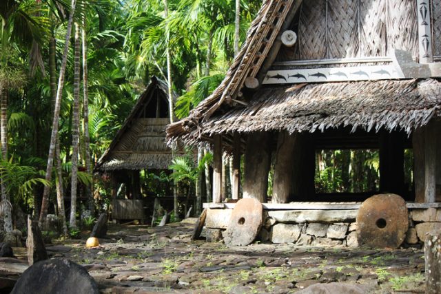 Two men’s houses in a village near Colonia in Yap.