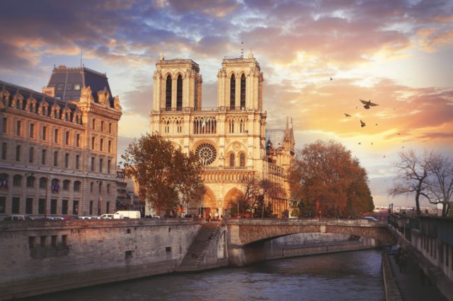 Cathedrale of Notre Dame de Paris and the river Seine by sunset