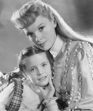 Publicity photo of American entertainers Judy Garland and Margaret O’Brien from the 1944 feature film Meet Me in St. Louis.