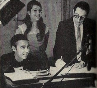 Rogers screens the tape replay with Betty Aberlin and Johnny Costa in 1969.