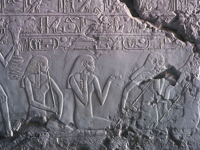 Relief of three female musicians