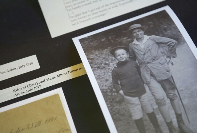 Photo of Eduard and Hans Albert Einstein glued to a black Bristol Board