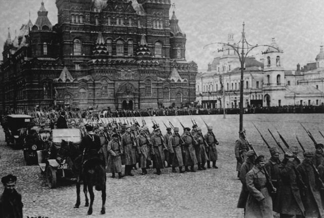 Bolshevik soldiers marching in a square.