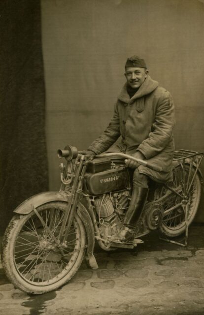 US Army lieutenant sitting on a Harley-Davidson motorcycle