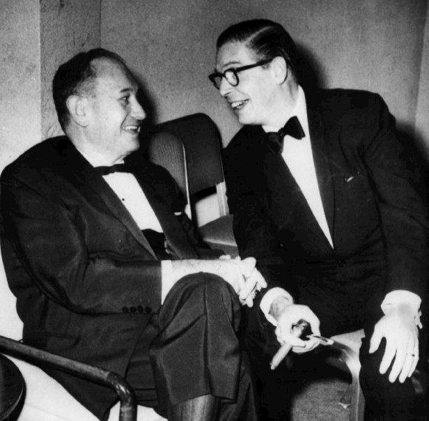 The last photo of Harry Parke (Harry Einstein) (Parkyakarkus) taken at a Los Angeles Friars’ Club dinner in 1958. He is shown conversing with Milton Berle. Shortly after this photo was taken, Parke collapsed into Berle’s lap from a fatal heart attack.