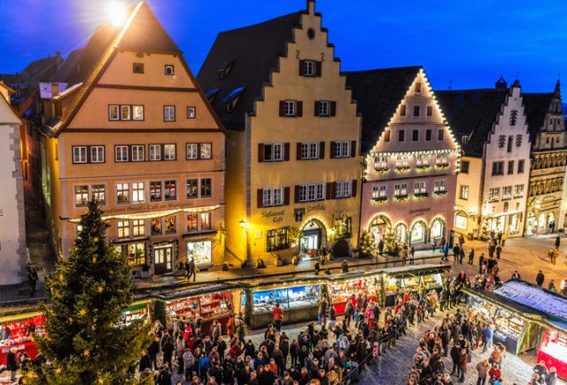 Rothenburg ob der Tauber, Germany, November 30, 2012: People waiting at the town square for the opening ceremony of the Reiterlesmarkt (Christmas market).