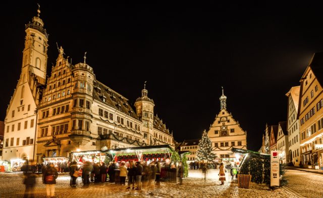 Night view on the world famous Christmas market in the medieval Franconian town of Rothenburg ob der Tauber.